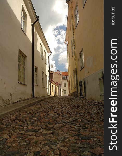 An old and narrow street in Tallin. An old and narrow street in Tallin