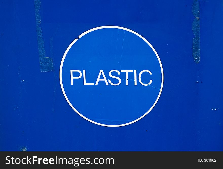 The lable on the side of a plastics recycling bin. The lable on the side of a plastics recycling bin