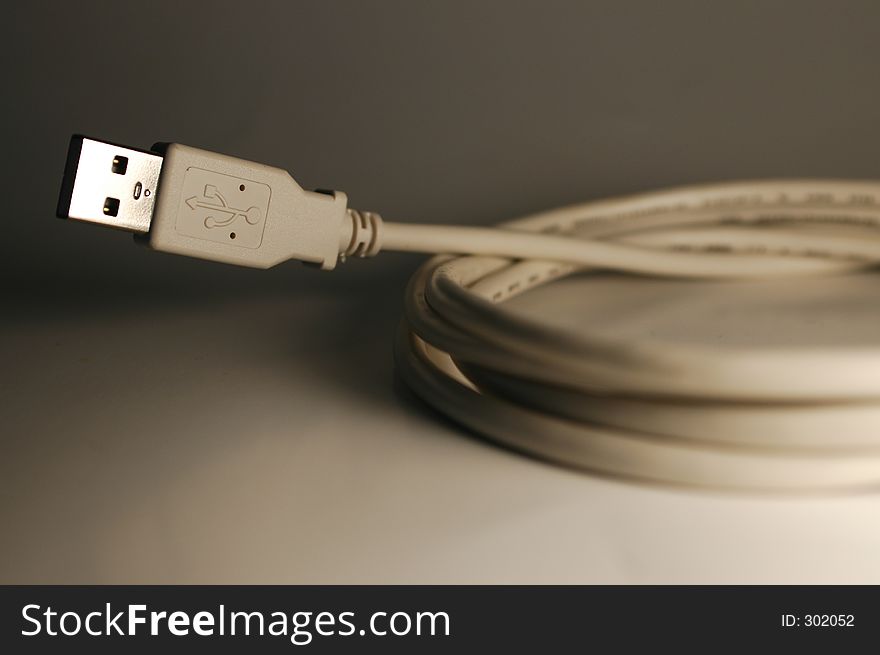 Coiled USB Cable - Computer End - Dark Background