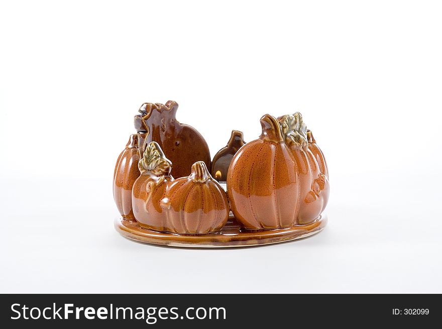 A ceramic pumpkin ring candle holder. Decoration for Thanksgiving and Halloween