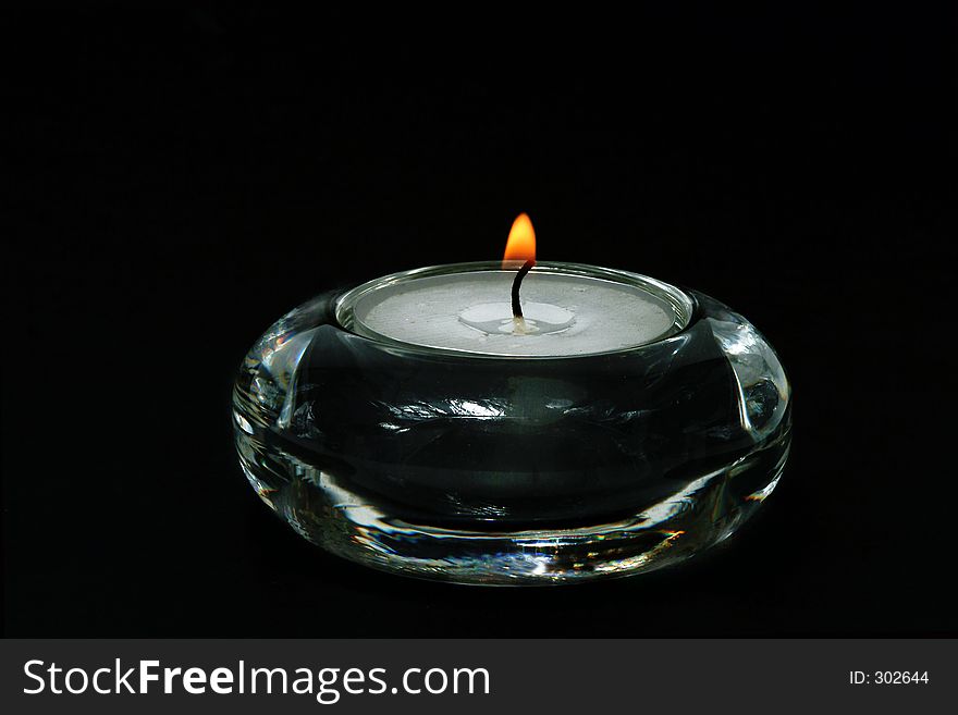Candle In Transparent Glass Vase