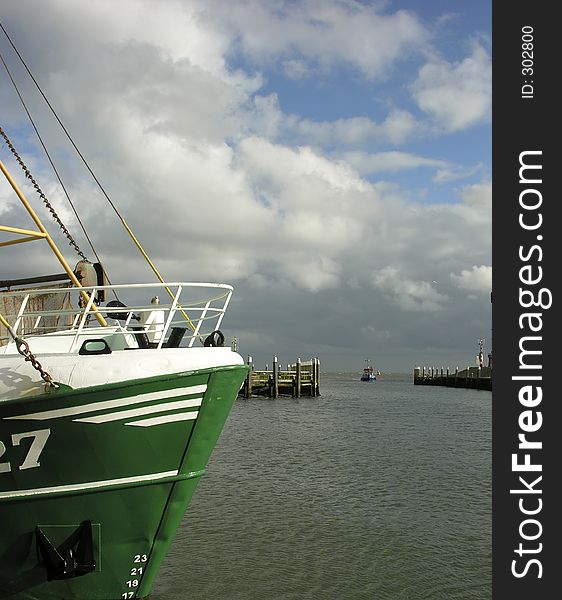 Trawler in the harbour of Oudeschild, Texel