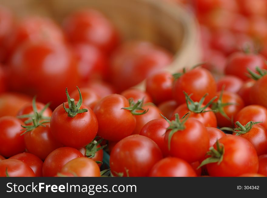 Tomatoes in a basket. Tomatoes in a basket