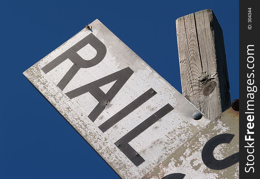 Close-up of Old Railroad Crossbucks Sign