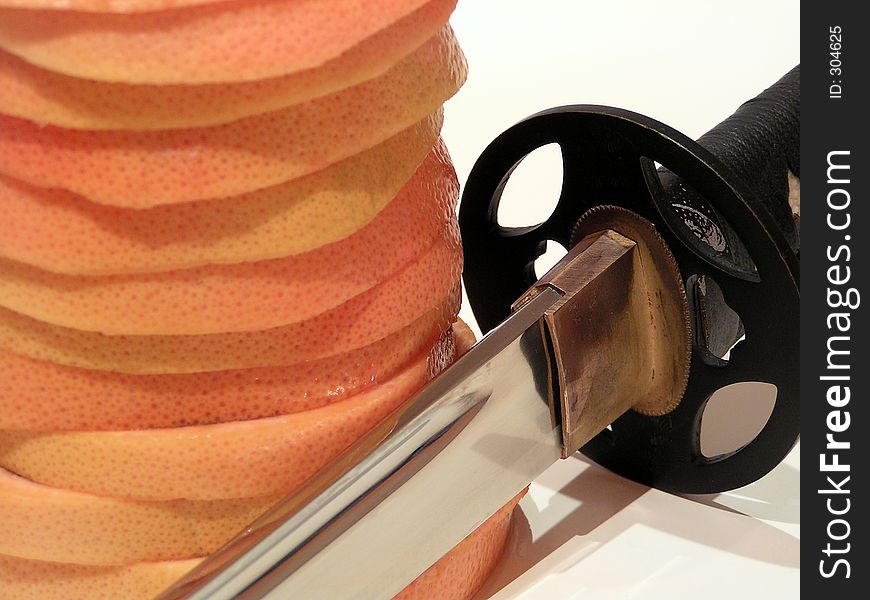 Japanese sword and fruit. Japanese sword and fruit