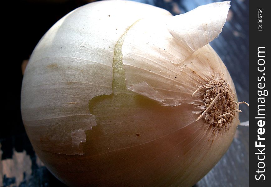 White onion with broken skin