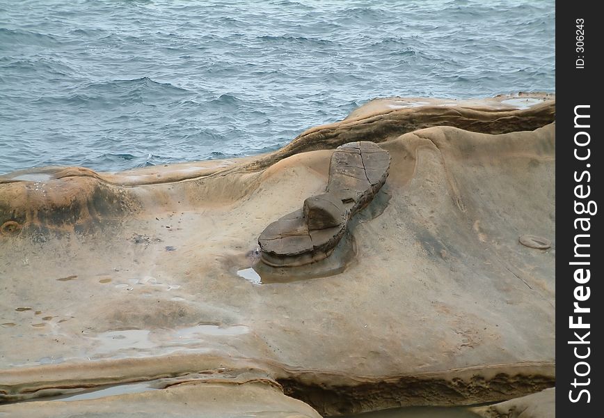 Sandal shaped rock at Yehliu, Taiwan. Sandal shaped rock at Yehliu, Taiwan