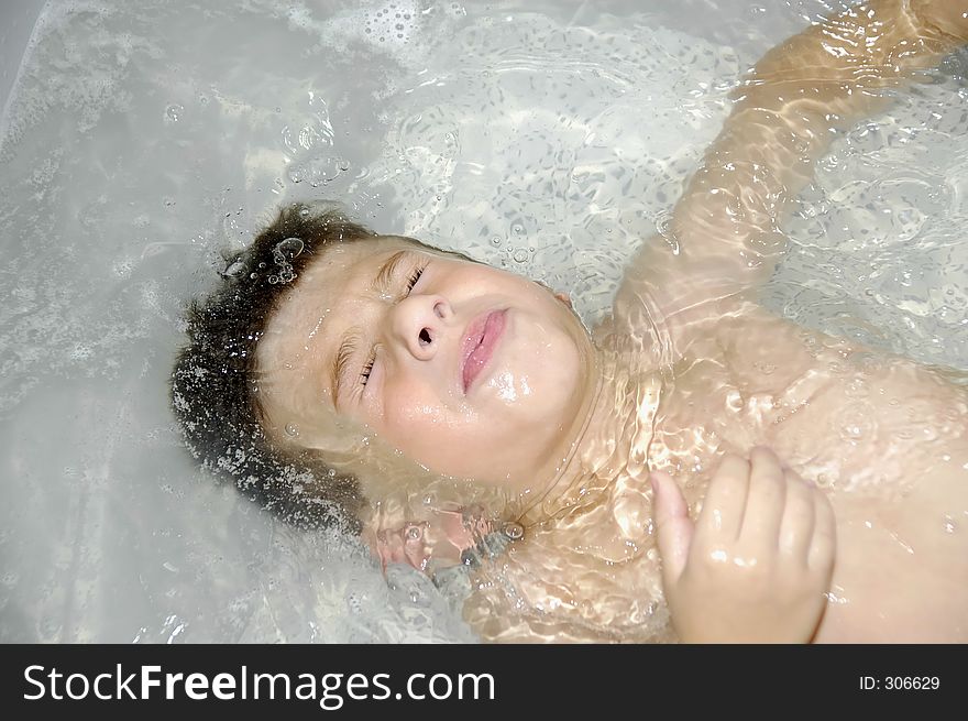 Young Boy In a Bath. Young Boy In a Bath