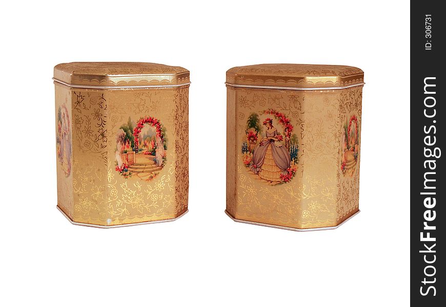 Pair of old gold-colored, decorated canisters. Pair of old gold-colored, decorated canisters