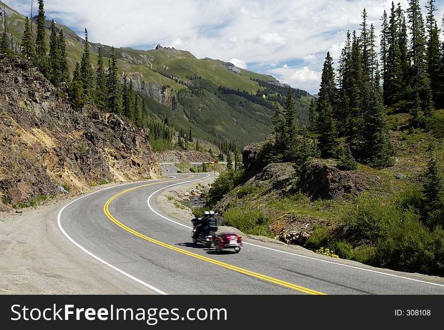 Winding road through the mountains. Winding road through the mountains.