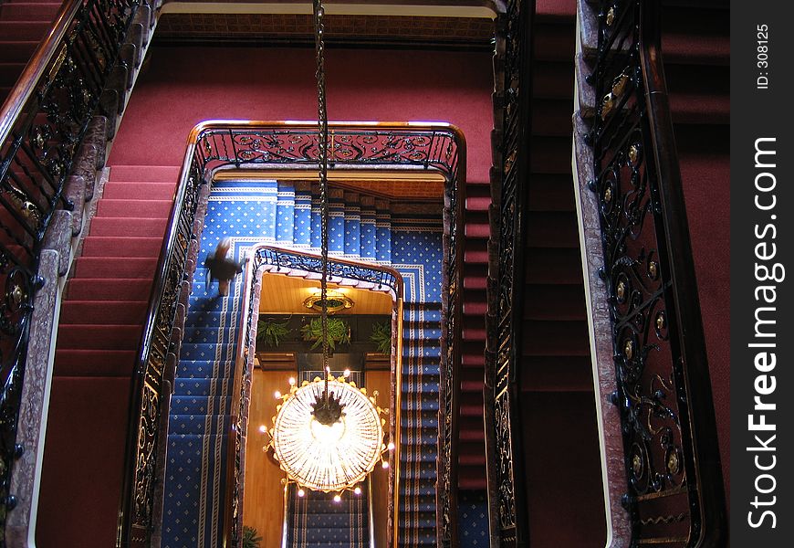 Spiral Staircase and Crystal Chandelier