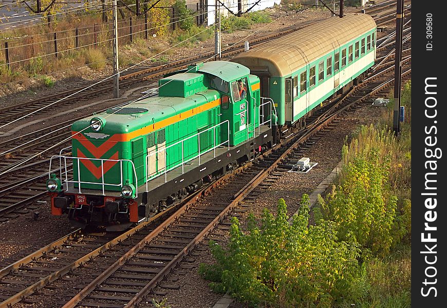 Switching diesel locomotive hauling railway car 1027_10