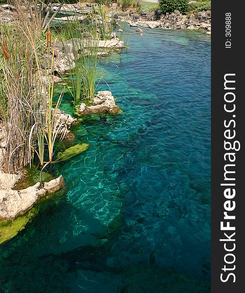 Some beautiful blue water used in this landscaping design in this garden. Some beautiful blue water used in this landscaping design in this garden