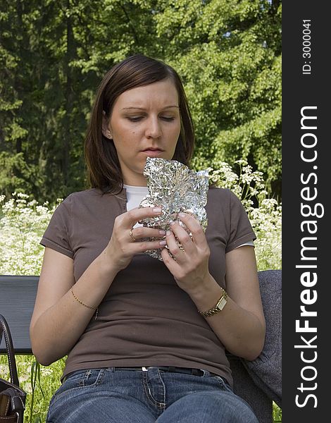 Business lunch in the park, young woman. Business lunch in the park, young woman