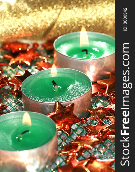 Green candles with decoration stars. Green candles with decoration stars