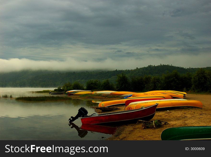 Canoes in the river bank