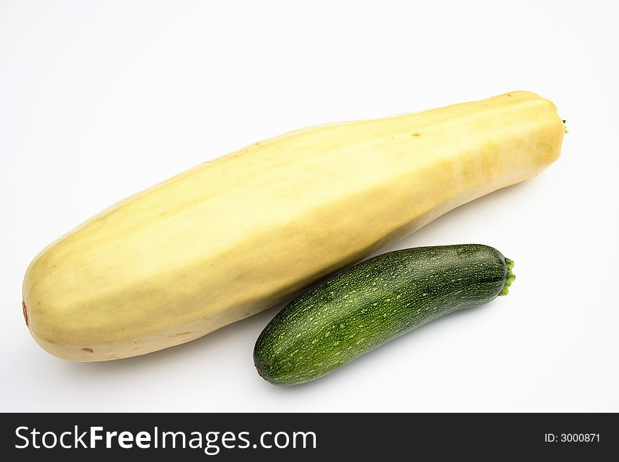 On a photo a vegetable marrow. The photo is isolated