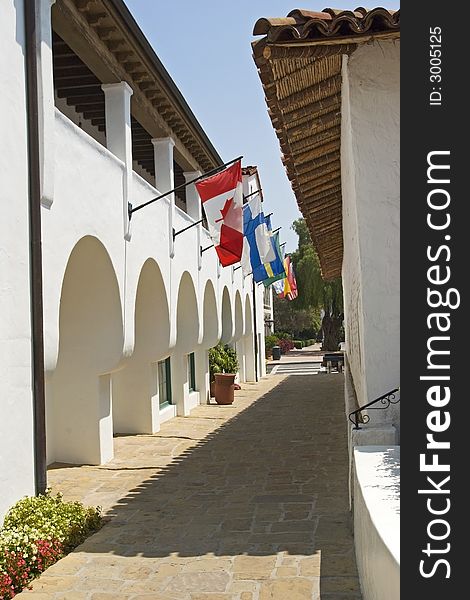 Spanish style architecture in Santa Barbara, California with flags of nations as decor