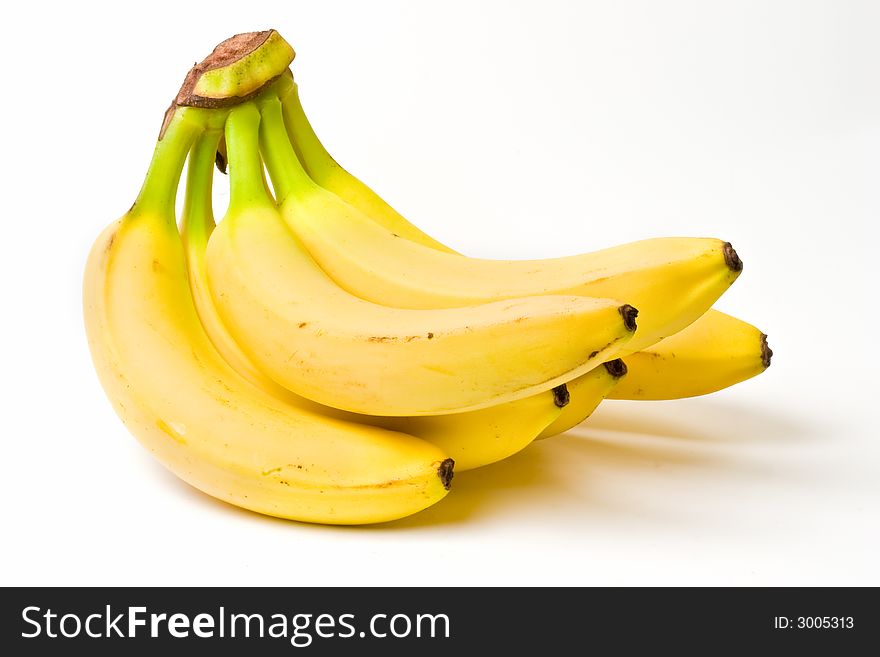 Fresh yellow bananas isolated on white background