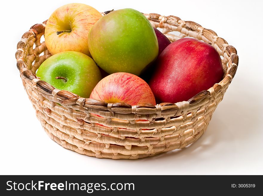 Basket of red,yellow and green apples