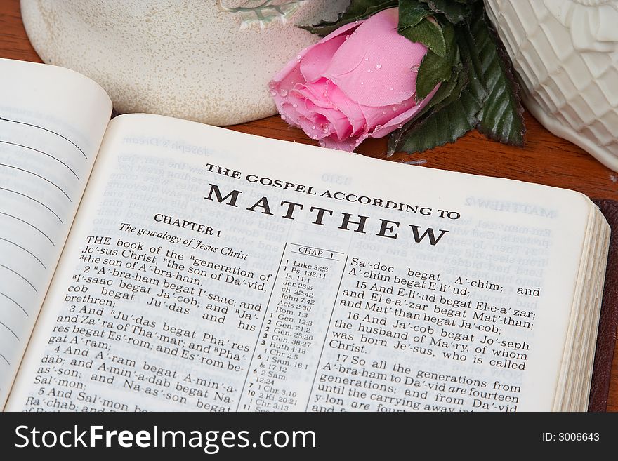 An open Bible turned to Matthew.