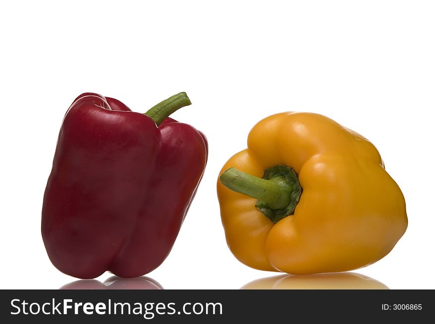 Colorful peppers isolated over white background