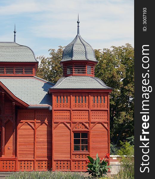 View side of the wooden house. View side of the wooden house