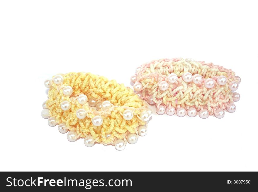 Hair elastics with perls isolated on the white.