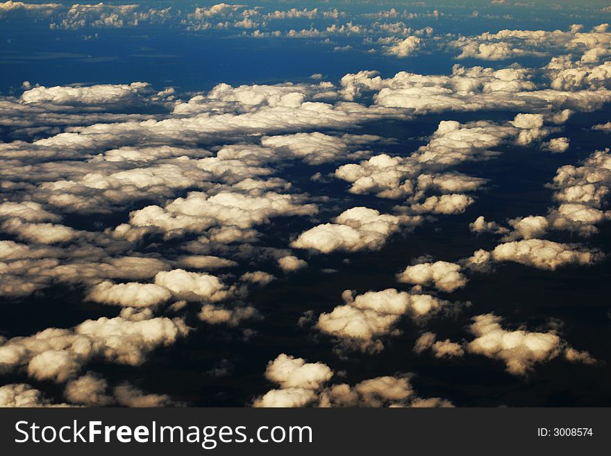 Aerial view on white clouds