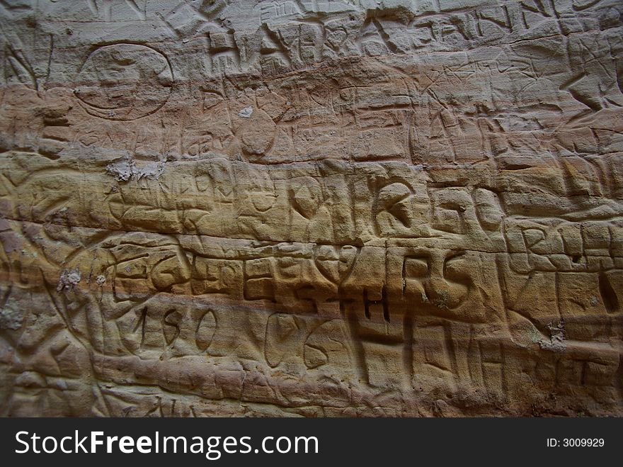 Carved names and things in sandstone. Carved names and things in sandstone