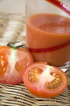 Half Of Tomato With Tomato Juice Stock Images Half Of Tomato With Tomato Juice Stock Images