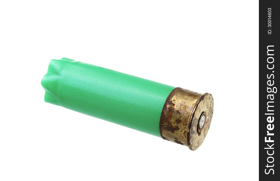 Green shotgun shell isolated on white background