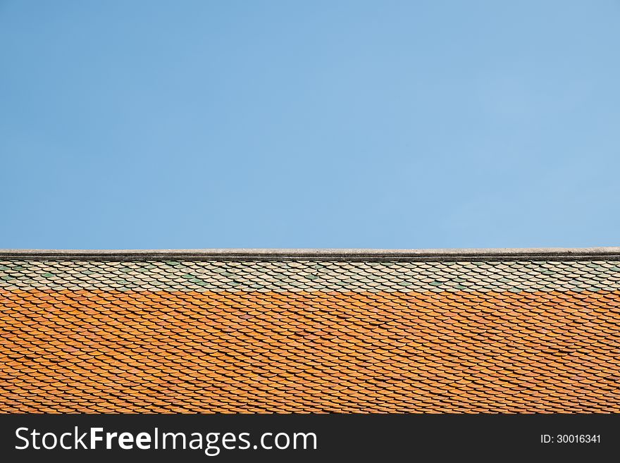 Buddhist temple ceramic roof and the blue sky