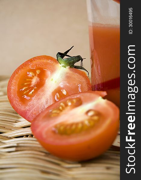 Close up two pieces of fresh tomato. Close up two pieces of fresh tomato