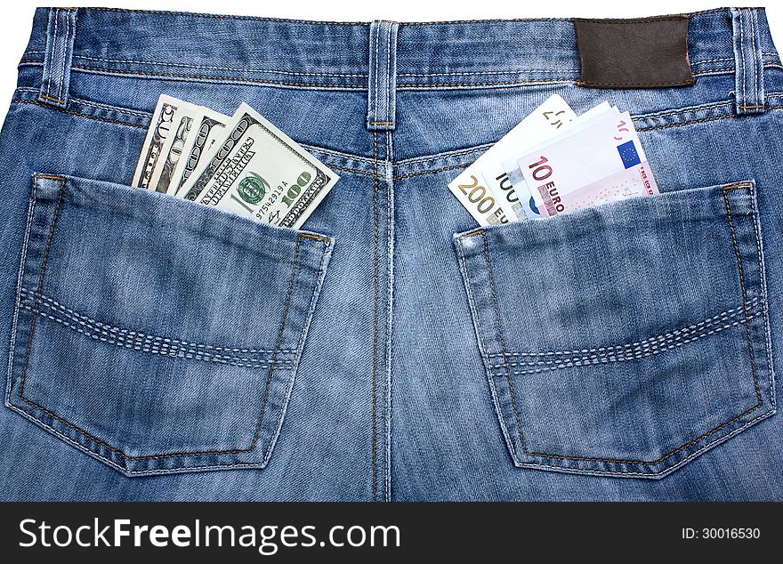 Jeans with a different currency in their pockets - a symbol of balance between the euro and the dollar. Jeans with a different currency in their pockets - a symbol of balance between the euro and the dollar