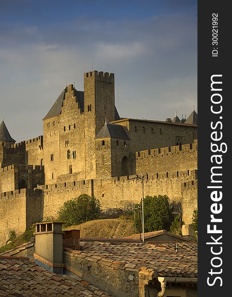 The beautiful fortified town on Carcassonne in Southern France in golden evening sunlight. The beautiful fortified town on Carcassonne in Southern France in golden evening sunlight