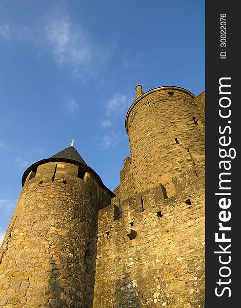 The beautiful fortified town on Carcassonne in Southern France in golden evening sunlight. The beautiful fortified town on Carcassonne in Southern France in golden evening sunlight