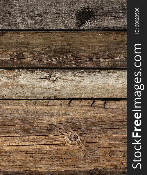 Old weathered rough plank wood texture background. Old weathered rough plank wood texture background