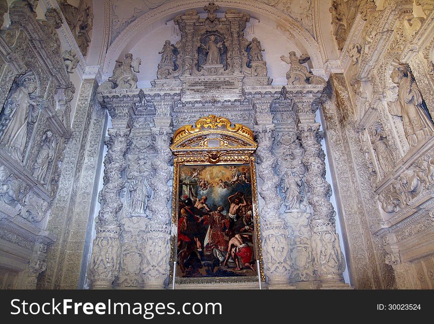 A decorated baroque chapel inside the old church of santa croce at lecce in italy