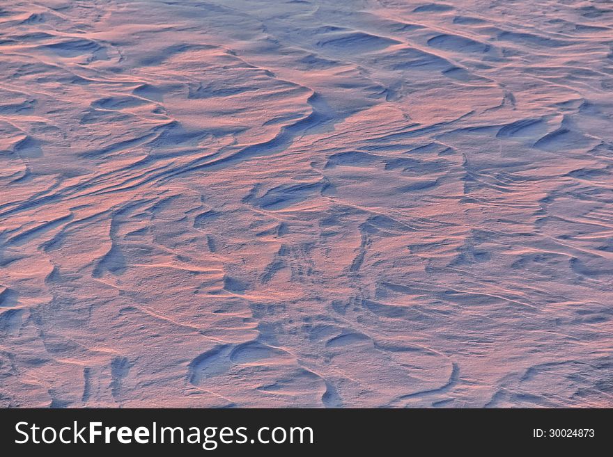 Surface texture of new fallen snow at sunset. Surface texture of new fallen snow at sunset