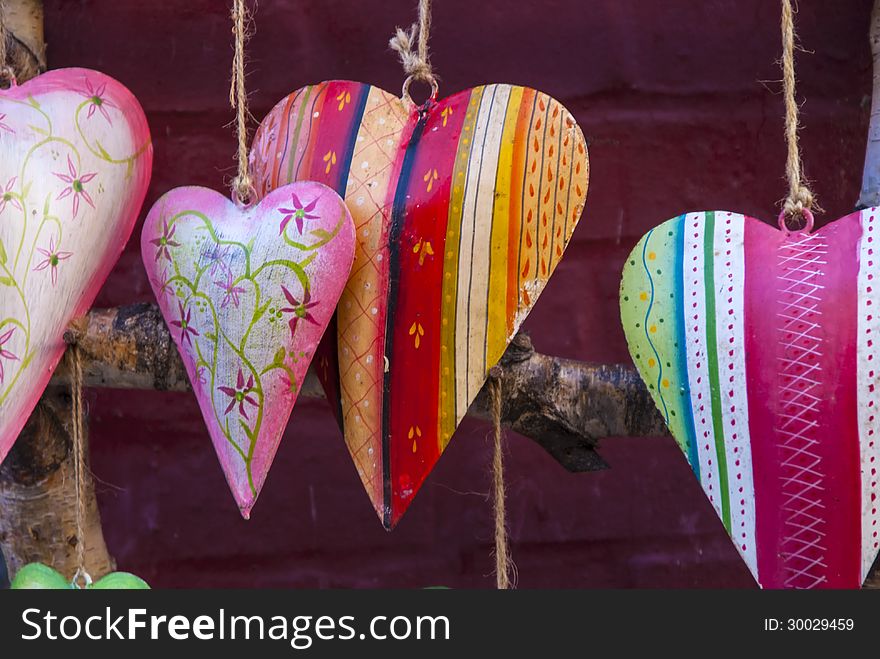 Colorful ceramic heart decoration on the wall