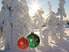 Red And Green Christmas Ornaments In Winter Forest With Snow Stock Photos