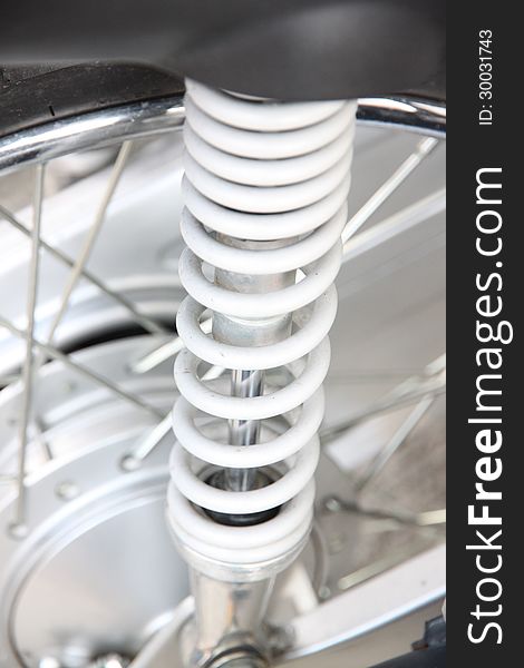The white Shock Absorber in Motorcycle. The white Shock Absorber in Motorcycle.
