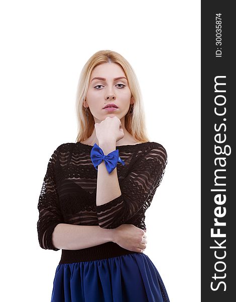 Attractive girl wearing a bow at her hand isolated on white studio shot