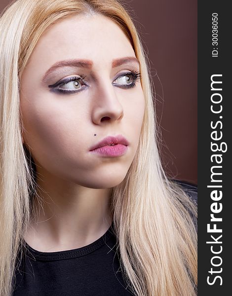 Close up portrait of a beautiful rock girl studio shot