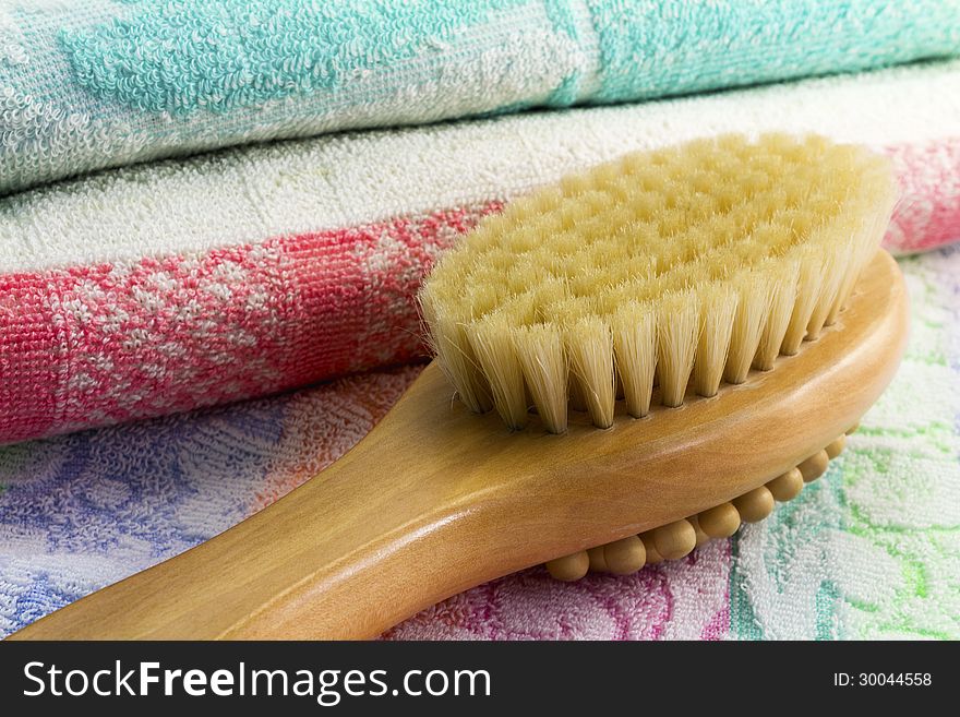 Wooden Brush With The Handle For Massage Of A Body And A Towel.