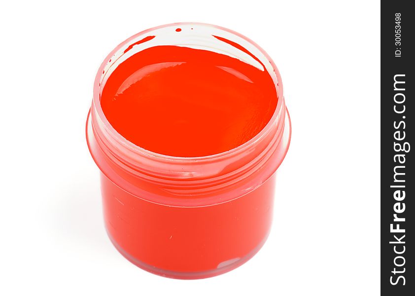 Container with Red Gouache Paint isolated on white background. Top View