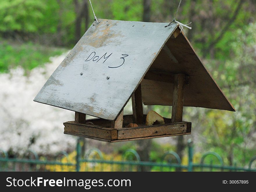 An old feeder in a botanical garden