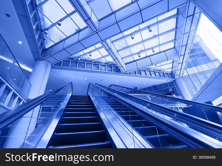 Escalator in modern business center
