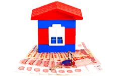 Toy House Out Of Blocks Is On The Banknotes Stock Photos